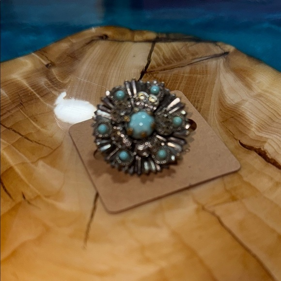 Vintage Silver and Blue Sunburst Brooch with Intricate Metalwork - Picture 1 of 4